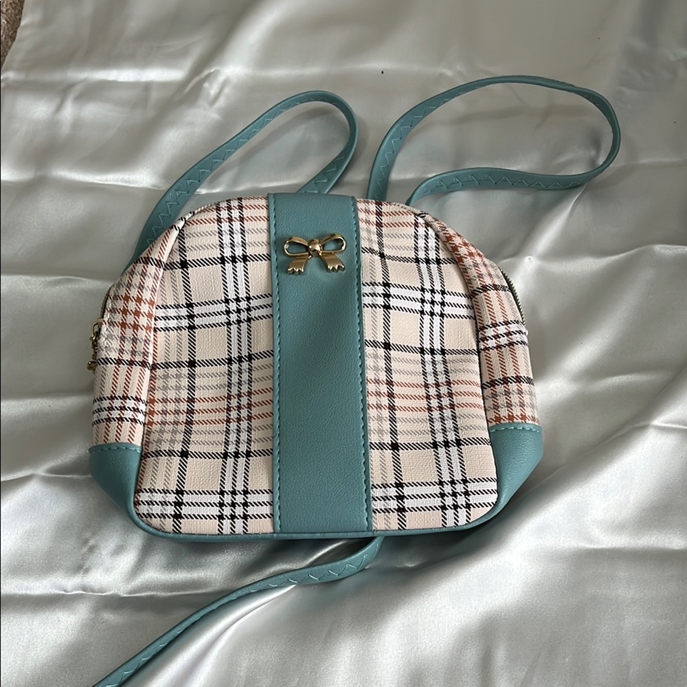 Cream and Blue Backpack with Modern Design